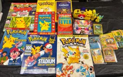Lot of Pokemon Items; Cards, Guides, keychains, Handbooks, soundtrack, camera - Image 1