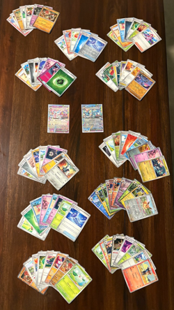Prismatic Evolutions Pokemon Card Lot, includes Sylveon and Vaporeon - Image 1