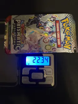 Pokemon TCG Prismatic Evolutions Booster Pack NEW SEALED HEAVY 22.34 GRAMS - Image 1