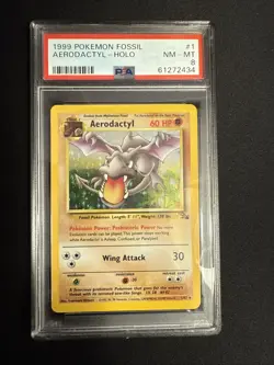1999 Pokemon TCG Aerodactyl Holo Base Set Fossil Card 1/62 PSA 8 NM-MT - Image 1