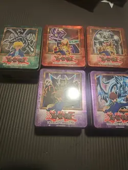(4) Yu-Gi-Oh! Collector’s Tins - Red-Eyes, Blue-Eyes, Dark Magician, Black Skull - Image 1