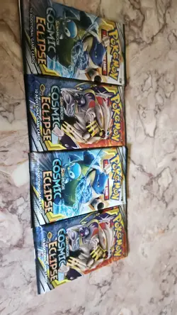 Pokemon TCG Cosmic Eclipse Booster Pack 4 Packs - Image 1