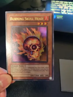 YUGIOH Burning Skull Head [WB01-EN003] Super Rare Lightly Played - Image 1