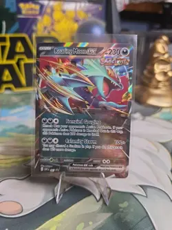 Roaring Moon ex 067 Sv: Scarlet & Violet Black Star Promo Card Holo - Image 1