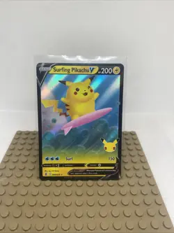 Pokemon Pikachu v Surfing Holo Rare Card 8/25 Celebrations - Image 1