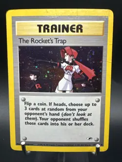 POKEMON TCG THE ROCKET'S TRAP 19/132 GYM HEROES HOLO SWIRL - Image 1