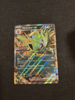 Pokemon TCG Tyranitar EX Cosmos Holo Prismatic Evolutions 64/131 Set Stamp - Image 1