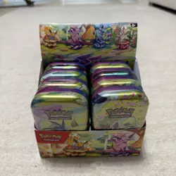 NEW Pokemon Prismatic Evolutions Mini Tin Display Box (8 Unopened Tins) - Image 3