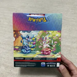 NEW Pokemon Prismatic Evolutions Mini Tin Display Box (8 Unopened Tins) - Image 4