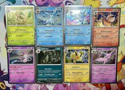 Pokemon Prismatic Evolutions Costco Mini Tin Cosmo Promos (8) Umbreon Sylveon - Image 1