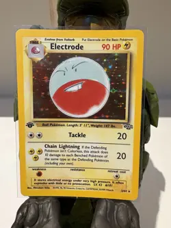Vintage 1999 Pokemon Electrode Holo Rare 1st Edition Jungle 2/64 - Image 1