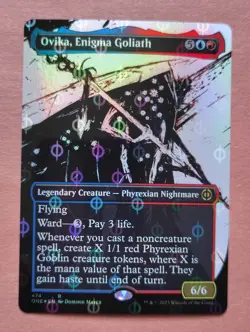 1x Ovika, Enigma Goliath (Showcase) (Step-and-Compleat FOIL) **NEAR MINT** - Image 1