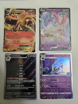 Pokemon Holo Lot- 4 Cards- Charizard, Sylveon, Lunala, Gothitelle - Image 1