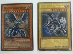 Blue-Eyes Shining Dragon MOV-EN001 AND dmg Red-Eyes B. Dragon 1st Edition - Image 1