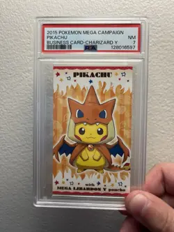PSA 7 MINT Poncho Wearing Pikachu MEGA Charizard Y BUSINESS Pokemon Card 317 - Image 1