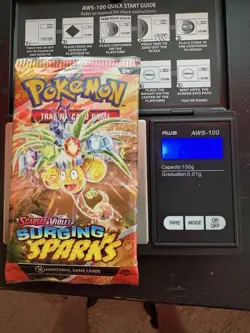 VERY HEAVY! 22.67g Surging Sparks Pokemon TCG Booster Pack - Image 1