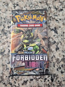Pokemon Sun & Moon Forbidden Light Booster Pack - Image 1