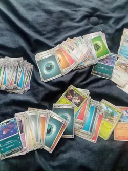 232 Bulk Pokemon Cards Basic , Energies, Trainers Few Holos - Image 3