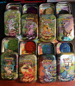 Pokemon Prismatic Evolutions Mini Tins Set (OPENED NO PACKS) + Prismatic Poster - Image 1