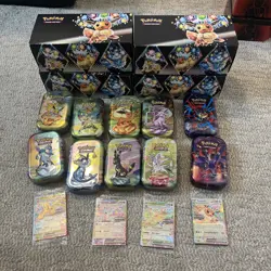Pokemon Prismatic Lot, 4 Promos, 4 Prismatic Surprise Boxes, 10 Tins No Packs - Image 1