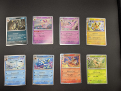 Pokemon TCG Prismatic Evolutions Costco Mini Tin Cosmos Promo Cards Set Of 8 NM - Image 1