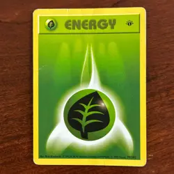 1st Edition Grass Energy 99/102 Base Set Pokemon Card - Image 1