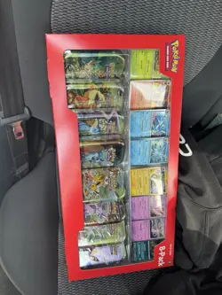 Pokemon Prismatic Evolutions Mini Tins Sealed 8 Pack Costco - Image 1