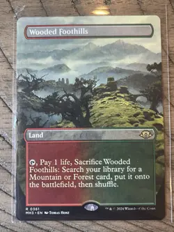 Wooded Foothills (Borderless) Modern Horizons 3 Regular - Image 1