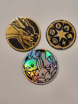 Mega Charizard, Hoenn Starters And Pokemon TCG Energy Coins Lot Of 3 - Image 1