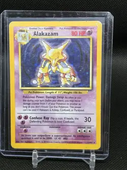 Pokemon TCG Alakazam Holo Rare Card 1/102 Base Set WOTC 1999 Heavily Played - Image 1