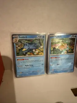 Pokemon TCG Mega Evolutions Psyduck 007 - Golduck 008 Black Star Promo - Image 1