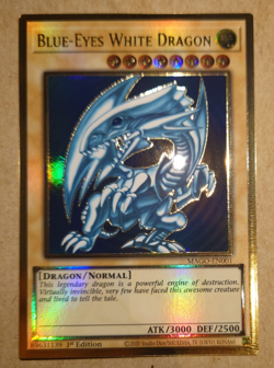 YUGIOH BLUE EYES WHITE DRAGON GOLD RARE MAGO-EN001 1ST EDITION - Image 1