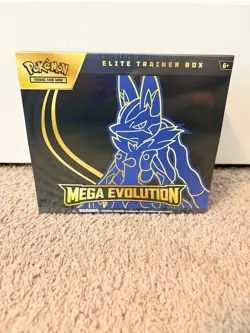 Pokemon Mega Evolution Lucario ETB Elite Trainer Box Mega Lucario In Hand - Image 1