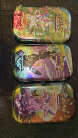 Pokemon TCG Scarlet & Violet Prismatic Evolutions Mini Tins X1 - Image 1