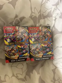 Pokemon TCG: Mega Evolution Booster Bundle in hand - Image 1
