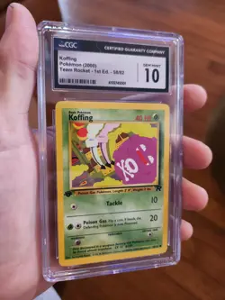CGC 10 GEM MINT Koffing 58/82 1st Edition Team Rocket 2000 Pokemon Card - Image 1