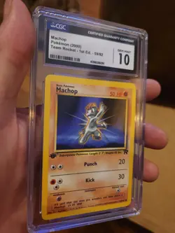 CGC 10 GEM MINT Machop 59/82 1st Edition Team Rocket Pokemon Card - Image 1