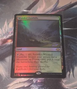 Magic The Gathering Modern Horizons 3 Wooded Foothills Foil M/NM - Image 1