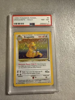 1999 Pokemon Fossil #4 Dragonite Holo Card PSA 8 - Image 1