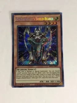 Yugioh! TCG Secret Rare 1st Edition Noble Knight's Shield Bearer BROL-EN017 - Image 1