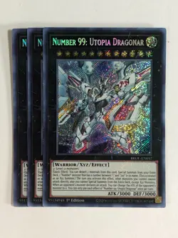 Yugioh! TCG Secret Rare 1st Ed 3x Playset Number 99 Utopia Dragonar BROL-EN057 - Image 1