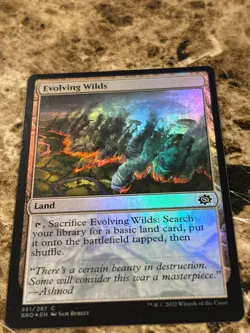 EVOLVING WILDS Magic MTG The Brothers' War Foil - Image 1