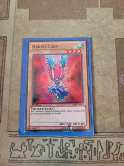 YUGIOH HARPIE LADY LCJW-EN082 SUPER 1ST ED NM - Image 1