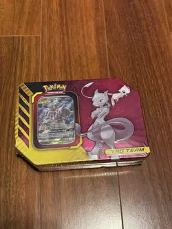 Pokemon TCG Mewtwo & Mew GX Tag Team Tin FACTORY SEALED SMALL DENT IN LID - Image 1