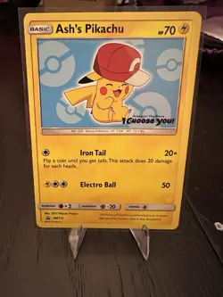 Ash’s Pikachu SM113 Ultra Rare Non Holo Exclusive Promo Pokemon Card - Image 1