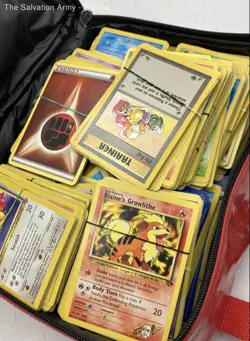 Lot Of Assorted 1st Edition Standard Size Pokemon Cards With Leather Bag - Image 1