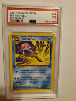 1999 Pokemon Fossil 1st First Edition Tentacruel 44/62 Non-Holo PSA 7 NM - Image 1