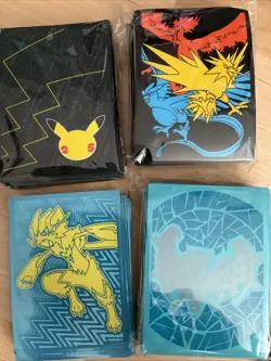 Used ETB Pokemon Sleeves From Celebrations, Hidden Fates, Ultra Prism - Image 1