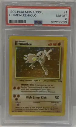 1999 POKEMON FOSSIL #7 HITMONLEE-HOLO PSA 8 NM-NT - Image 1