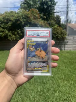 Pokemon TCG Raichu and Alolan Raichu GX Tag Team Ultra Rare Card #221/236 Psa 9 - Image 1